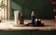 Adjacent morning and evening skincare trays centered on a continuous vanity transitioning from daylight to plum-toned evening light.